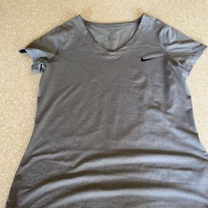 Grey Nike dri-fit exercise shirt